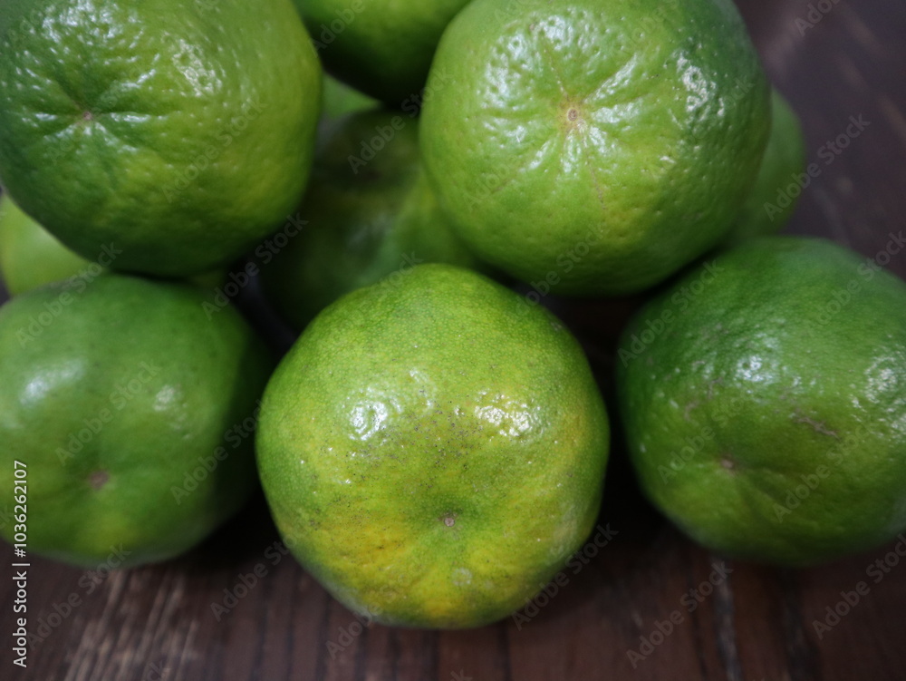 fresh food background of green tangerines design for healthy diet fresh food background of green tangerines design for healthy diet