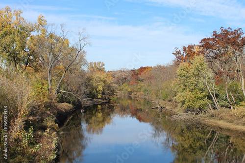 Des Plaines River with fall colors at Camp Ground Road Woods in Des Plaines, Illinois photo