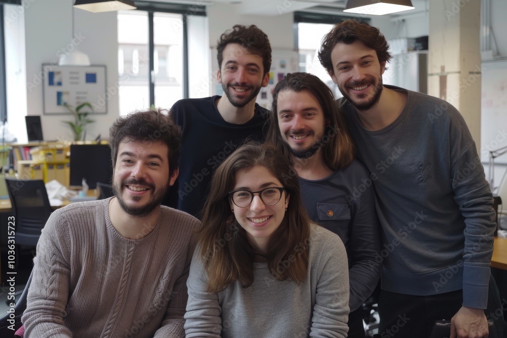 Group of happy young business people in a meeting at modern startup office Group of happy young business people in a meeting at modern startup office