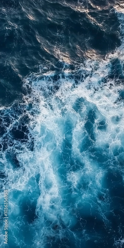 Aerial View of Turquoise Ocean Waves with Foamy White Crests