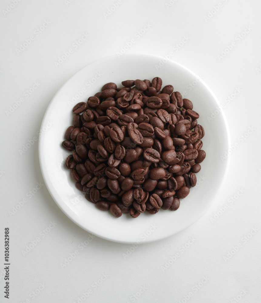 Top View of Coffee Beans on a Clean White Background Top View of Coffee Beans on a Clean White Background