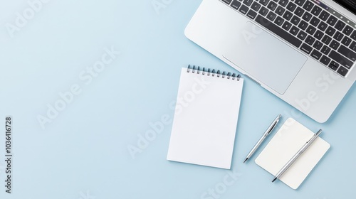 Minimal Workspace, Laptop and Notepad on Blue