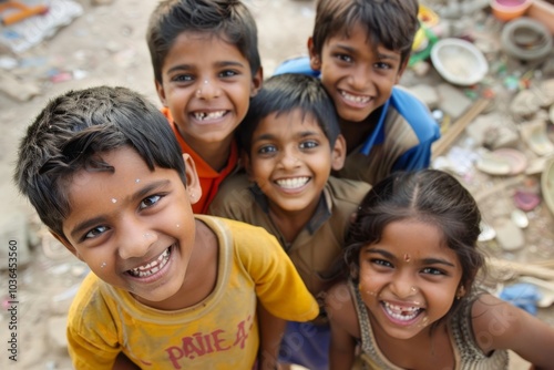 Group of happy indian kids smiling and having fun at the playground