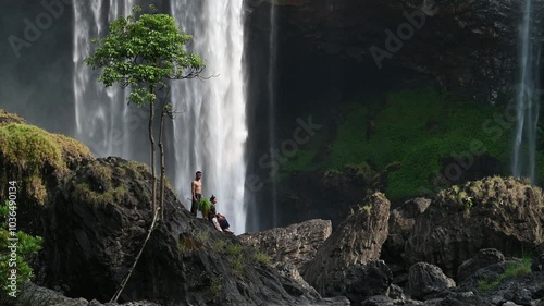 March 18, 2024: Panorama of K50 waterfall in Gia Lai province, Vietnam and images of the people here photo