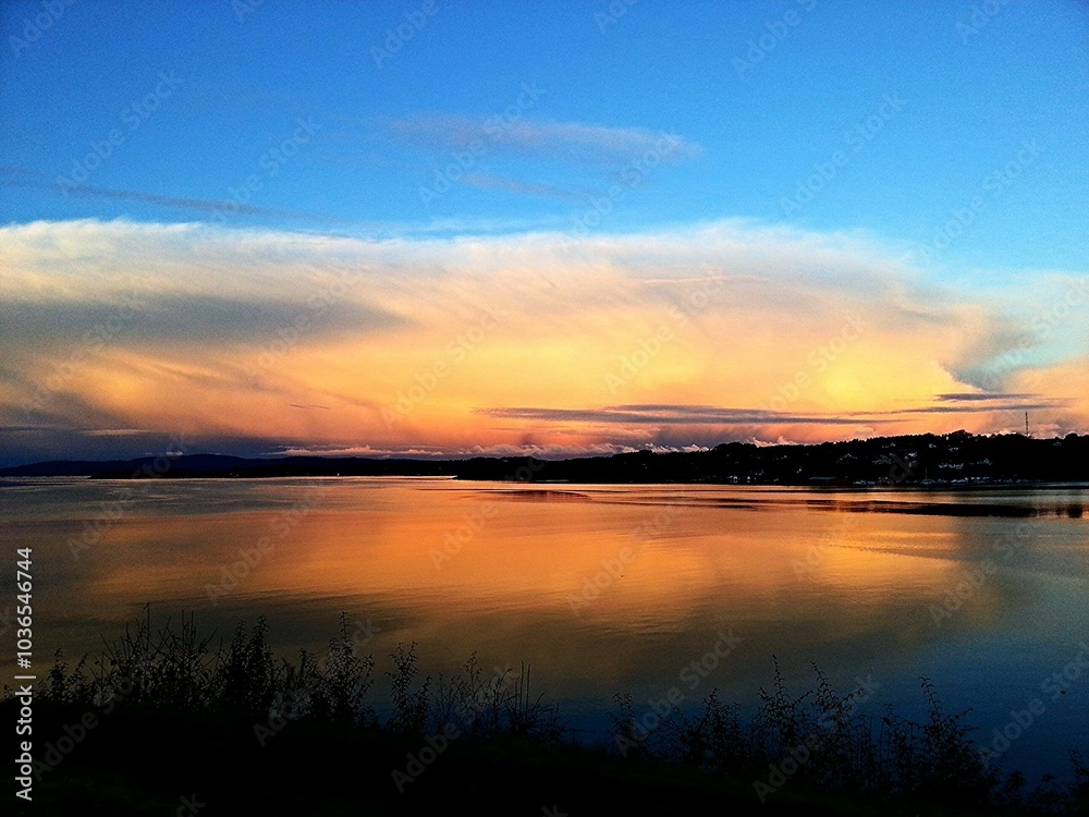 Calm waters and a colorful sunset at Fanahammeren, Norway. Calm waters and a colorful sunset at Fanahammeren, Norway.
