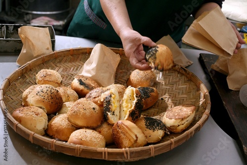 Charcoal-grilled peppercorns are a delicious Chinese snack often found at street stalls photo