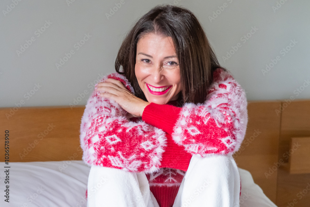 Smiling Woman Celebrating Christmas Morning, Enjoying The Cozy Atmosphere Of A Winter Holiday.Wear Christmas Clothes Smiling Woman Celebrating Christmas Morning, Enjoying The Cozy Atmosphere Of A Winter Holiday.Wear Christmas Clothes