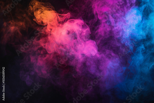 Neon multicolored atmospheric rainbow smoke on black background. Realistic scene close up.