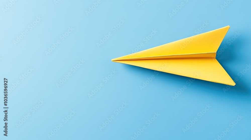 Yellow Paper Airplane on Blue Background Yellow Paper Airplane on Blue Background