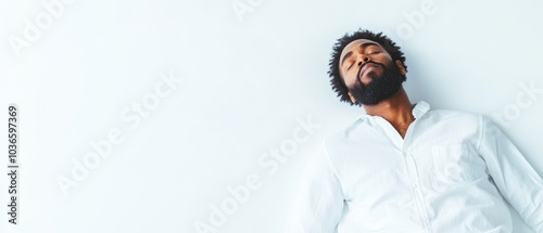 Resting Black African American man, serene expression, peaceful slumber, soft surroundings, tranquility and comfort evident, intimate moment captured. photo