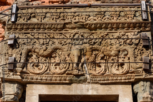 Bas-relief Sculpture at Prasat Lolei, Siem Reap, Cambodia. photo