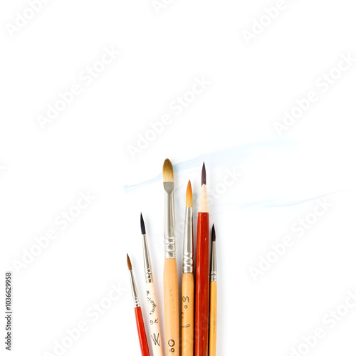 artist paint brushes in minimal style on empty background and simple look photo