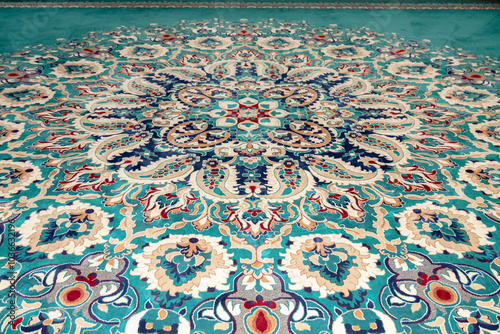 Detail of color and geometric shapes on a carpet