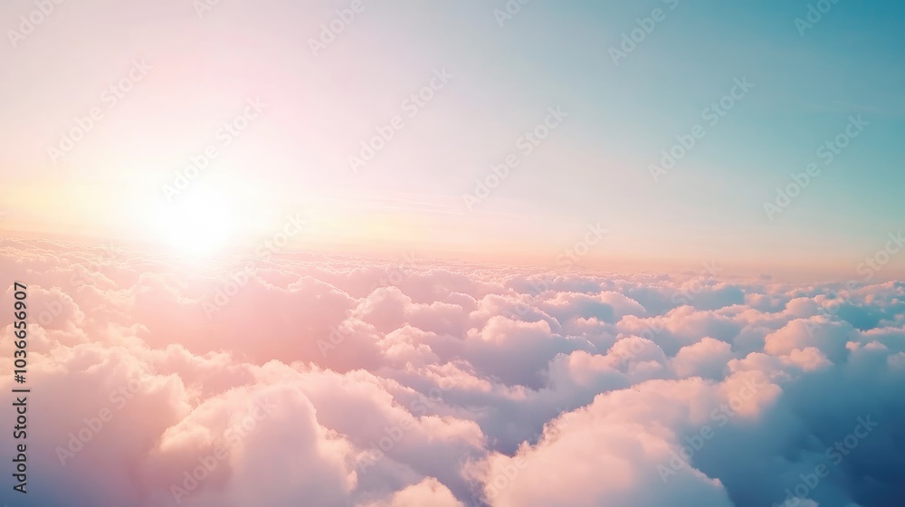 Soft pastel clouds stretch across the sky as sunlight bathes the scene in warmth and beauty Soft pastel clouds stretch across the sky as sunlight bathes the scene in warmth and beauty