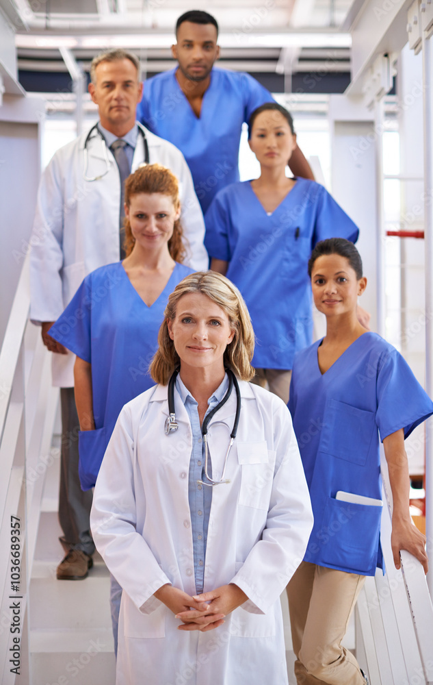 Portrait, group of people and medical staff in clinic for surgery, checkup or consultation. Teamwork, diversity and collaboration as doctors with pride in healthcare, medicine or wellness in hospital Portrait, group of people and medical staff in clinic for surgery, checkup or consultation. Teamwork, diversity and collaboration as doctors with pride in healthcare, medicine or wellness in hospital