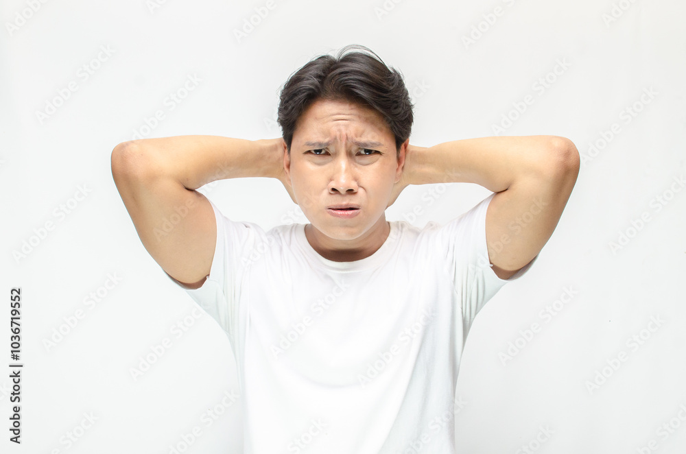 Angry face of young Asian man threatening to cut throat and looking for fight. Angry face of young Asian man threatening to cut throat and looking for fight.