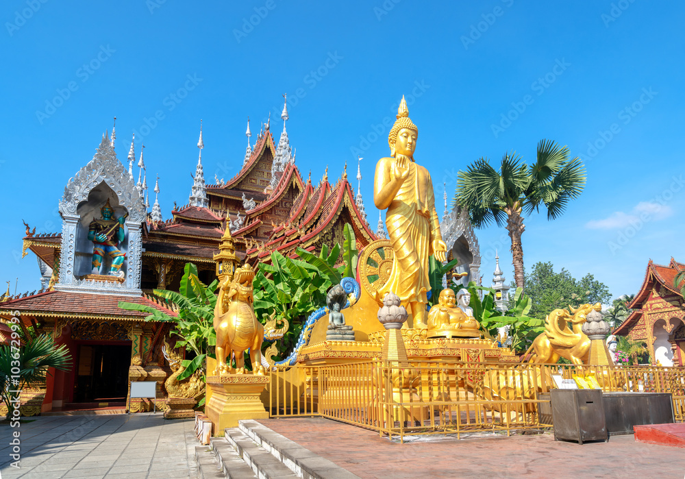 figure of Buddha and Buddhist palace in Xishuangbanna,China figure of Buddha and Buddhist palace in Xishuangbanna,China