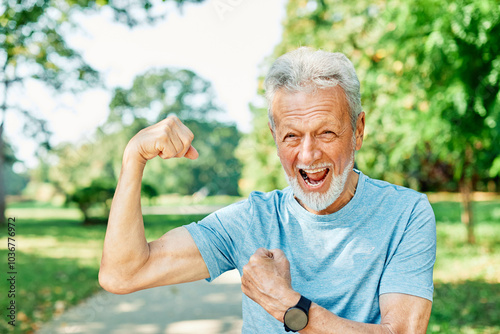 man muscle strength bicep  fitness senior strong arm muscular power training fit mature healthy body exercise confident macho motivation fun flexing
