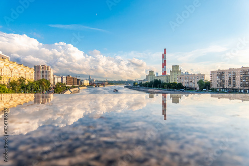 View of Berezhkovskaya Embankment in Moscow with reflection on a mirror stone surface photo