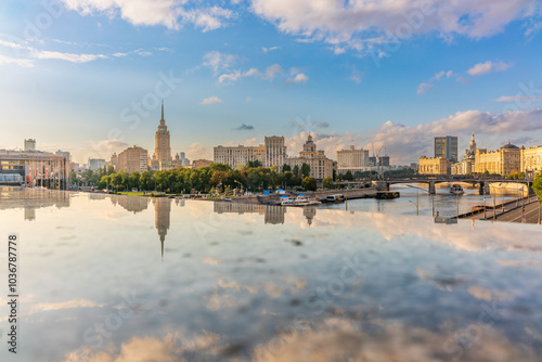 Panoramic view Borodinsky bridge, river Moscow, old buildings and high towers. View of the Borodinsky Bridge and the embankment in Moscow photo