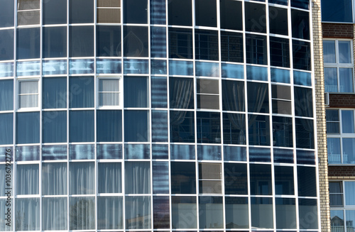 Panoramic Glazing of a Modern Residential Building