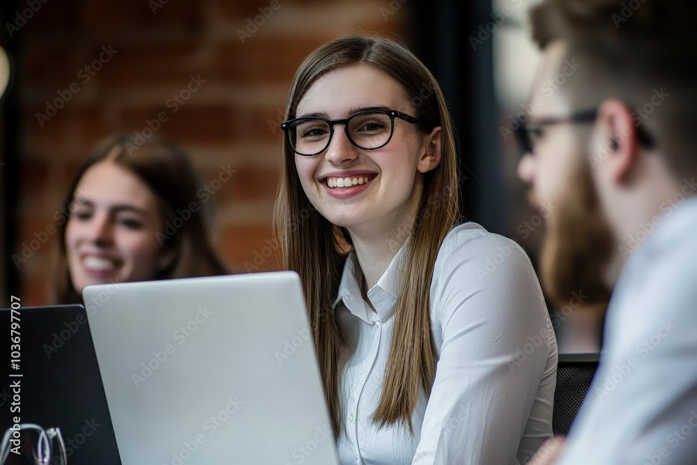 A woman smiled brightly at the camera during an office meeting, her enthusiasm lighting up the room as she engaged with her colleagues and shared her ideas with confidence. A woman smiled brightly at the camera during an office meeting, her enthusiasm lighting up the room as she engaged with her colleagues and shared her ideas with confidence.