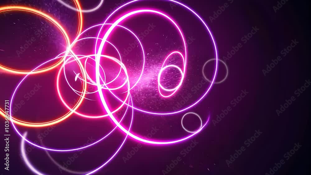Glowing Neon Light Rings in Dynamic Motion on Dark Background
Glowing Neon Light Rings in Dynamic Motion on Dark Background