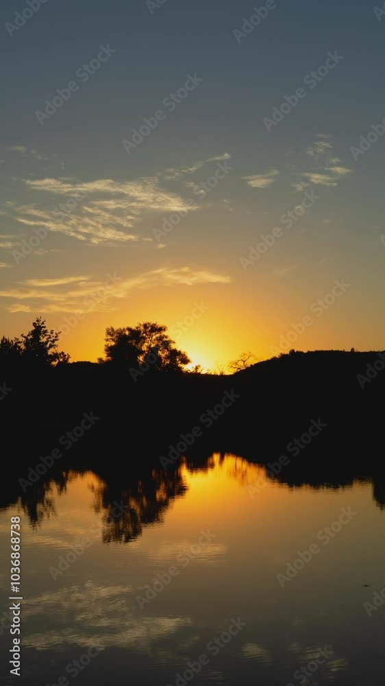 Peaceful Sunset Reflected in Lake Zoom Out Vertical Video Peaceful Sunset Reflected in Lake Zoom Out Vertical Video