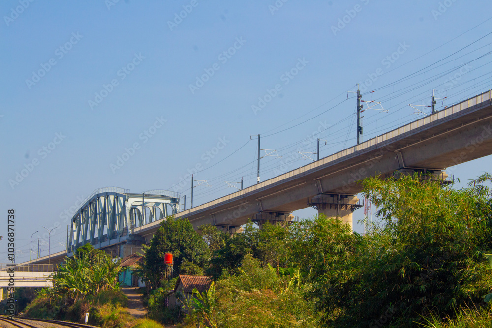 High-Speed Train Bridge in Indonesia Beneath a Clear Blue Horizon High-Speed Train Bridge in Indonesia Beneath a Clear Blue Horizon