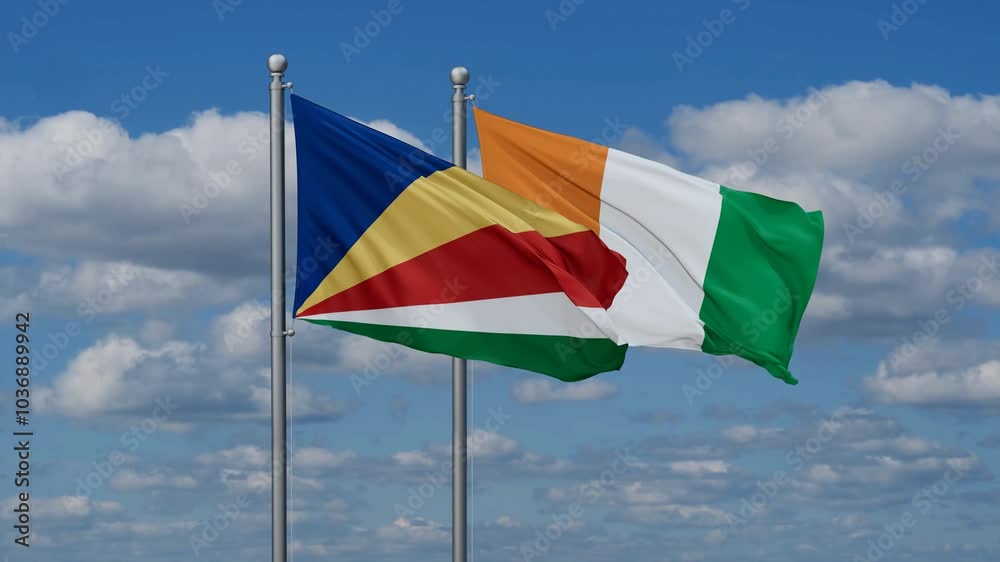 Ivory Coast or Cote d'Ivoire and Seychelles flags flying together, video concept of the relationship, two country cooperation concept Ivory Coast or Cote d'Ivoire and Seychelles flags flying together, video concept of the relationship, two country cooperation concept