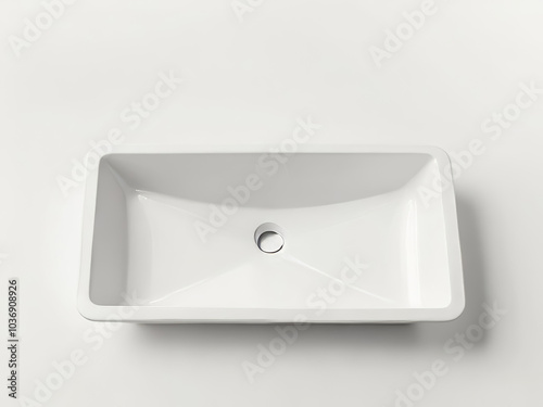 Studio photo of a white ceramic sink on a white background photo