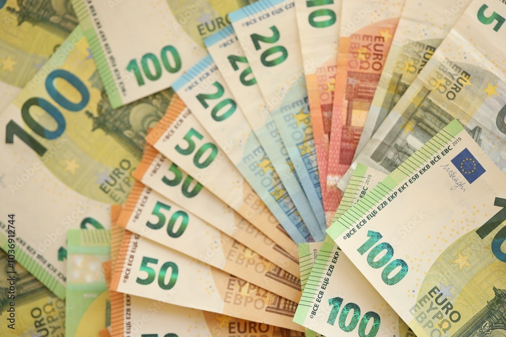 Pile of euro paper banknotes as finance background