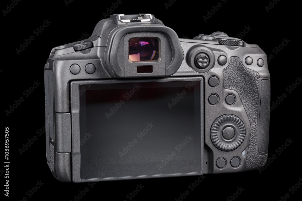 black 2020s professional 35mm full-frame mirrorless camera body with flip screen isolated on black background. black 2020s professional 35mm full-frame mirrorless camera body with flip screen isolated on black background.