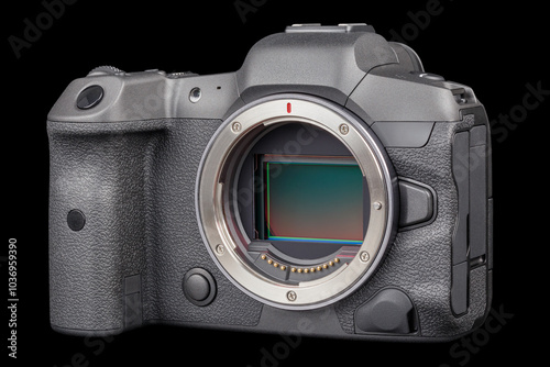 black 2020s professional 35mm full-frame mirrorless camera body with flip screen isolated on black background. photo