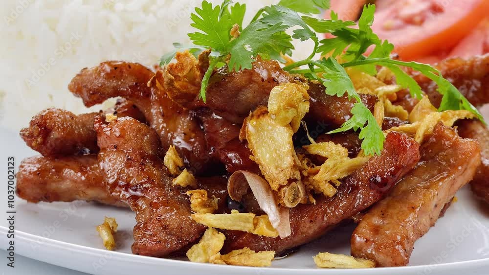 Thai style food, pork fried with crunchy garlic Thai style food, pork fried with crunchy garlic