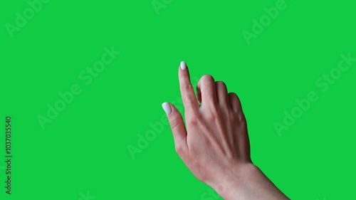 Swipe up gesture. Female hand scrolls up swiping on chroma key green screen background. Using a smartphone, tablet pc or a touchscreen. Interface concept. Scroll up and down and tap with finger