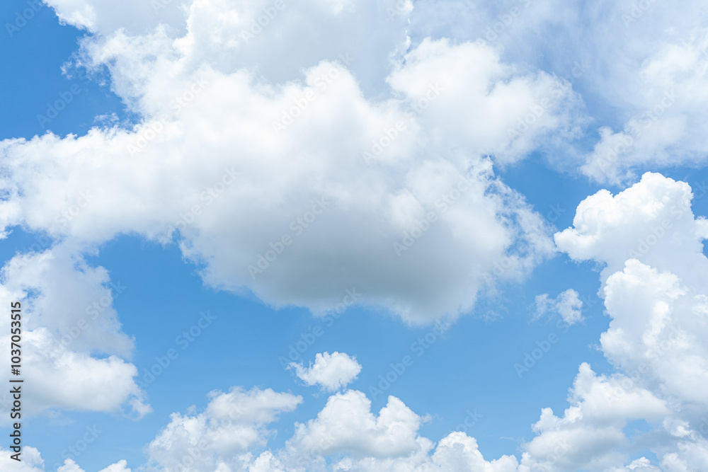 Blue sky with fluffy clouds, a breathtaking view Blue sky with fluffy clouds, a breathtaking view