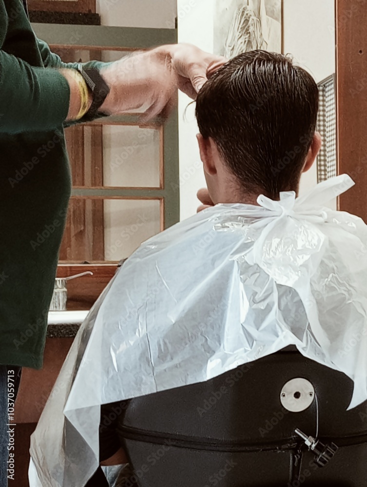 hairdresser cutting hair