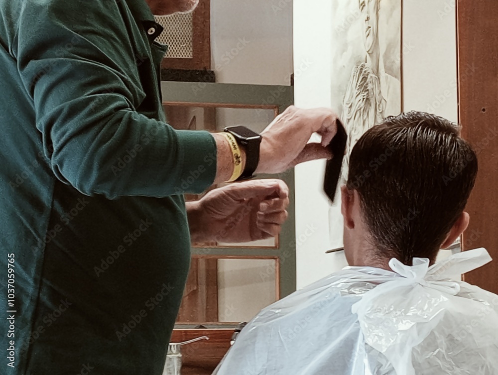 hairdresser cutting hair