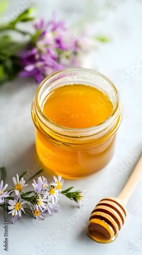 Honey Infused Hair Mask in Glass Jar with Wooden Spoon and Fresh Flowers Representing Nourishing Hair Care