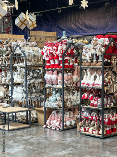 A vibrant and colorful display showcasing an array of festive Christmas decorations and beautiful ornaments in a retail setting, featuring a wide variety of seasonal items for all occasions