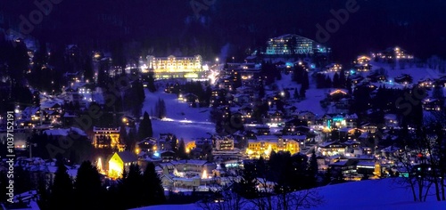 Night landscape of the town of Cortina d'Ampezzo in winter. Cortina d'Ampezzo, Belluno, Italy