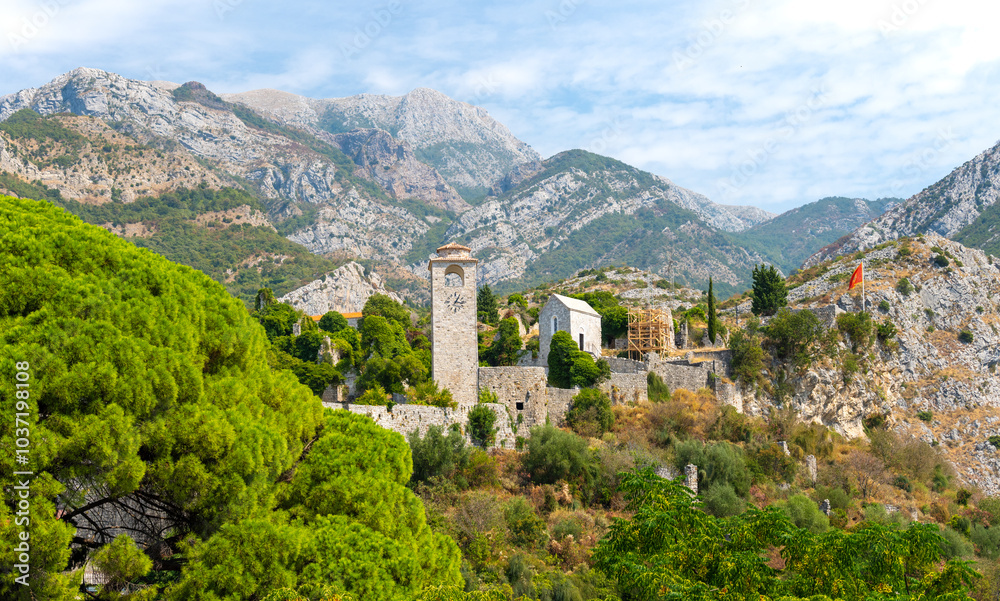 view on old fortress with clock tower in Stari Bar in Montenegro