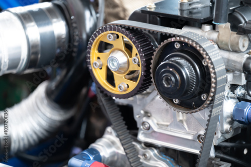 Close-up of high-performance engine precision timing belts and gears, highlighting advanced automotive engineering and design Ideal for enthusiasts and professionals in automotive field photo