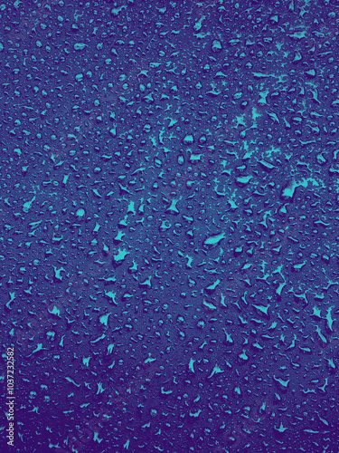 Blue Water drops on surface. Water droplets on background. Water droplets concept. Water drops on a background. Banner with raindrops.