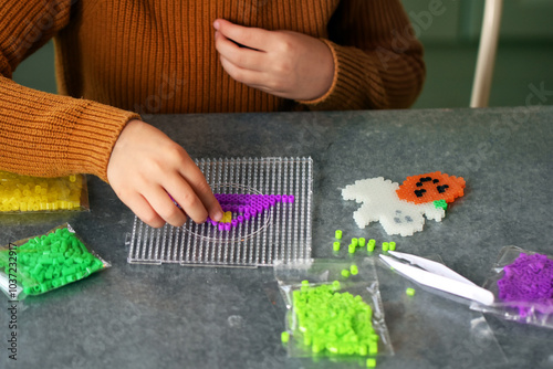 Halloween creative leisure, hand bead zoom view child hand neon color ironing bead