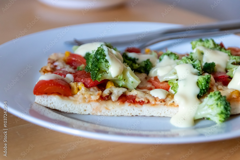Authentic delicious slice of vegetarian pizza for healthy lifestyle of vegetarians and vegans with fast food snack as piece of pizza with broccoli and paprika and sweet corn and cheese topping snacks Authentic delicious slice of vegetarian pizza for healthy lifestyle of vegetarians and vegans with fast food snack as piece of pizza with broccoli and paprika and sweet corn and cheese topping snacks