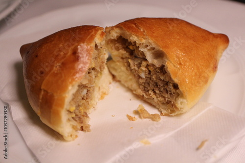 Russian cuisine: pirozhki (baked bun with fillings)