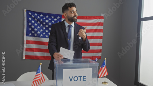 A young hispanic man gives a thumbs-up in a voting room with american flags, portraying democratic participation. photo