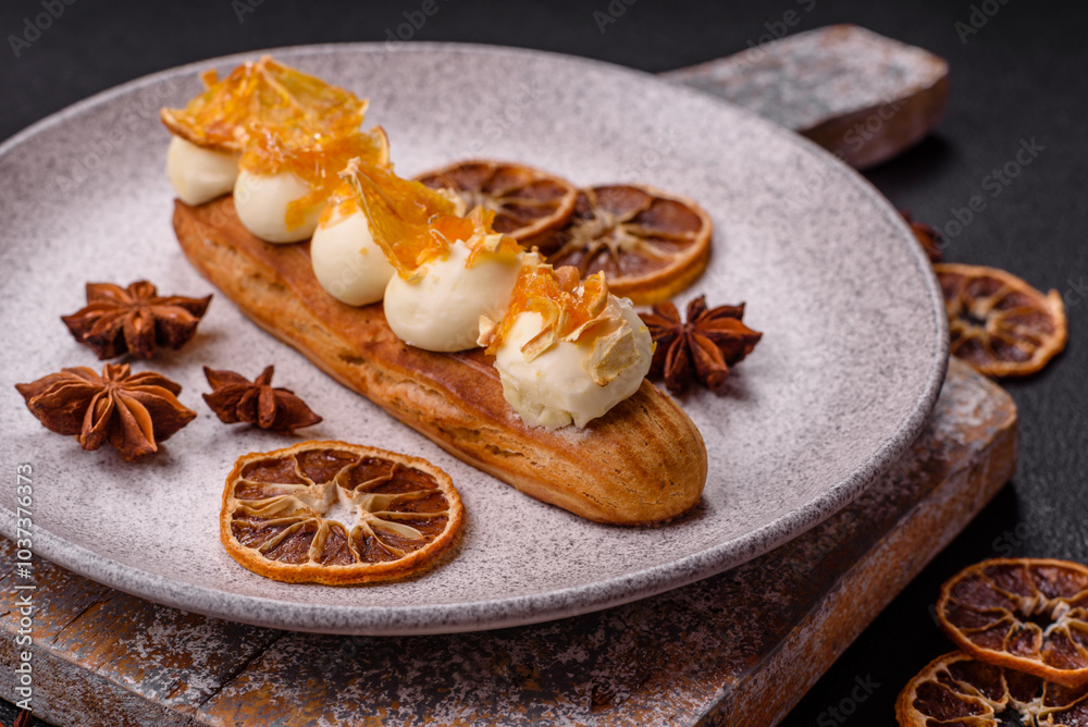 Fototapeta premium Sweet dessert eclairs or profiteroles with chocolate filling